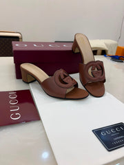 Gucci Interlocking G leather mules