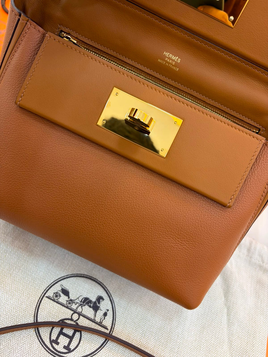 Hermès 24/24 21 bag in gold leather