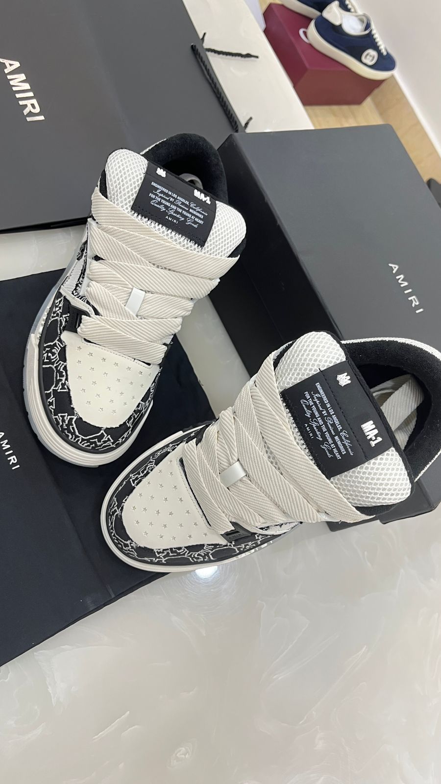 Amiri MA-1 sneakers in white and  black