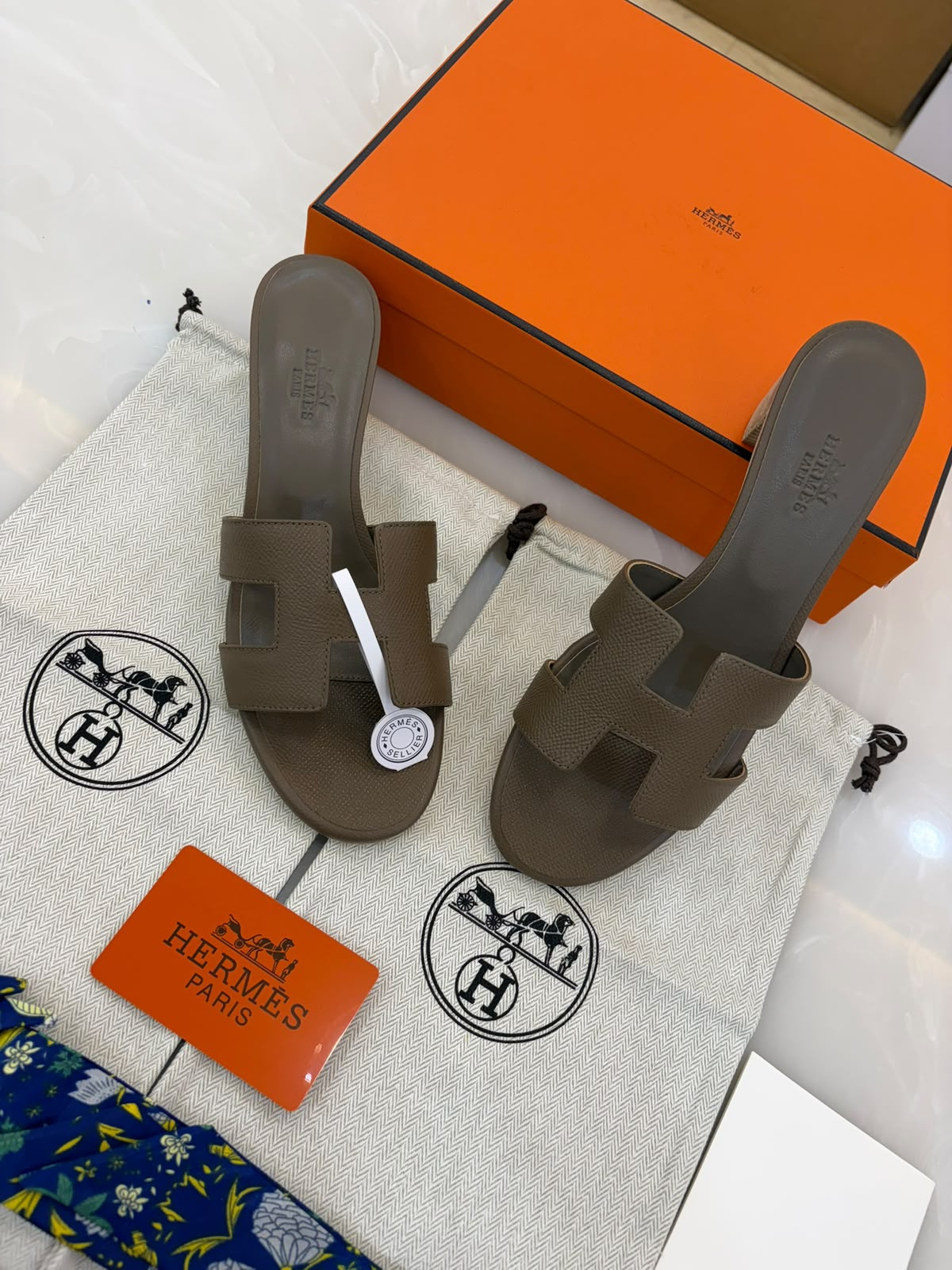 Hermès Oasis sandals in the Etoupe shade