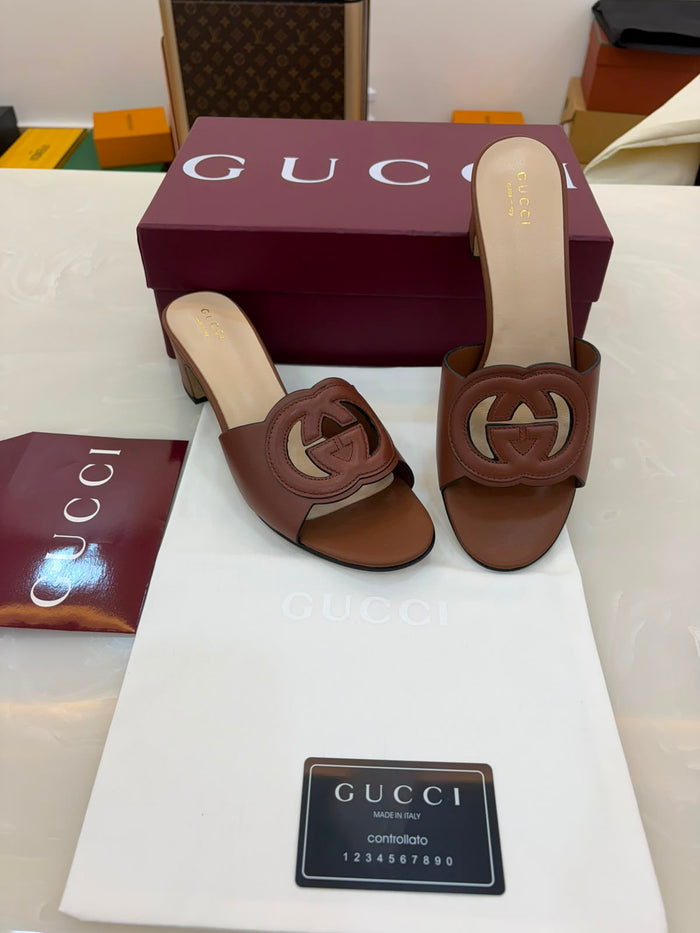 Gucci Interlocking G leather mules