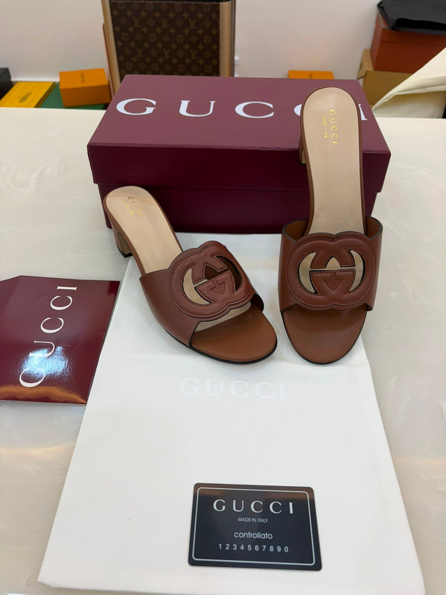 Gucci Interlocking G leather mules