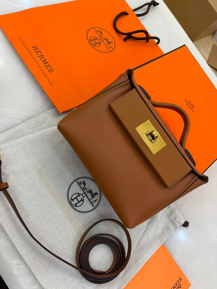 Hermès 24/24 21 bag in gold leather