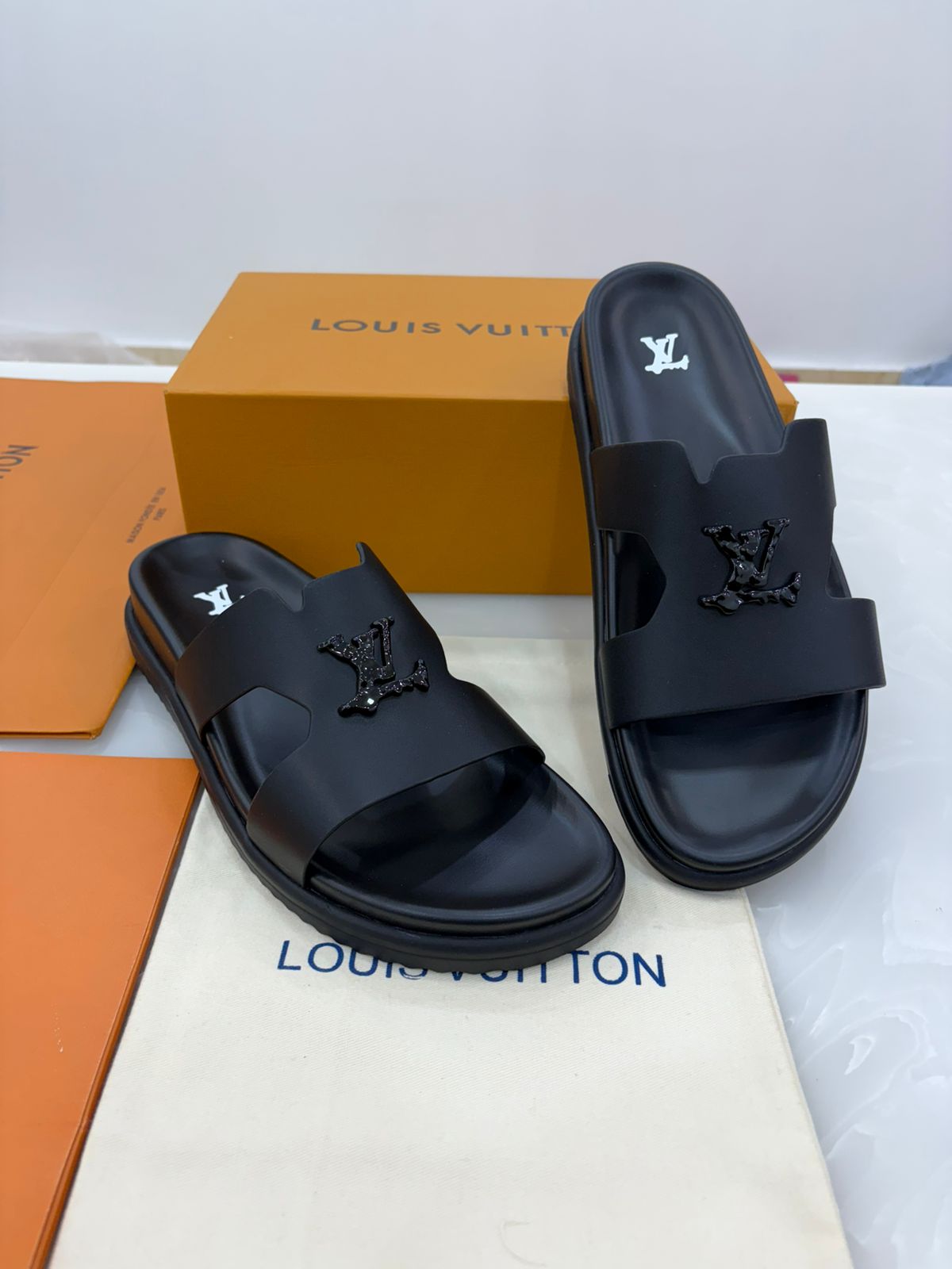 Black Louis Vuitton Oasis mules