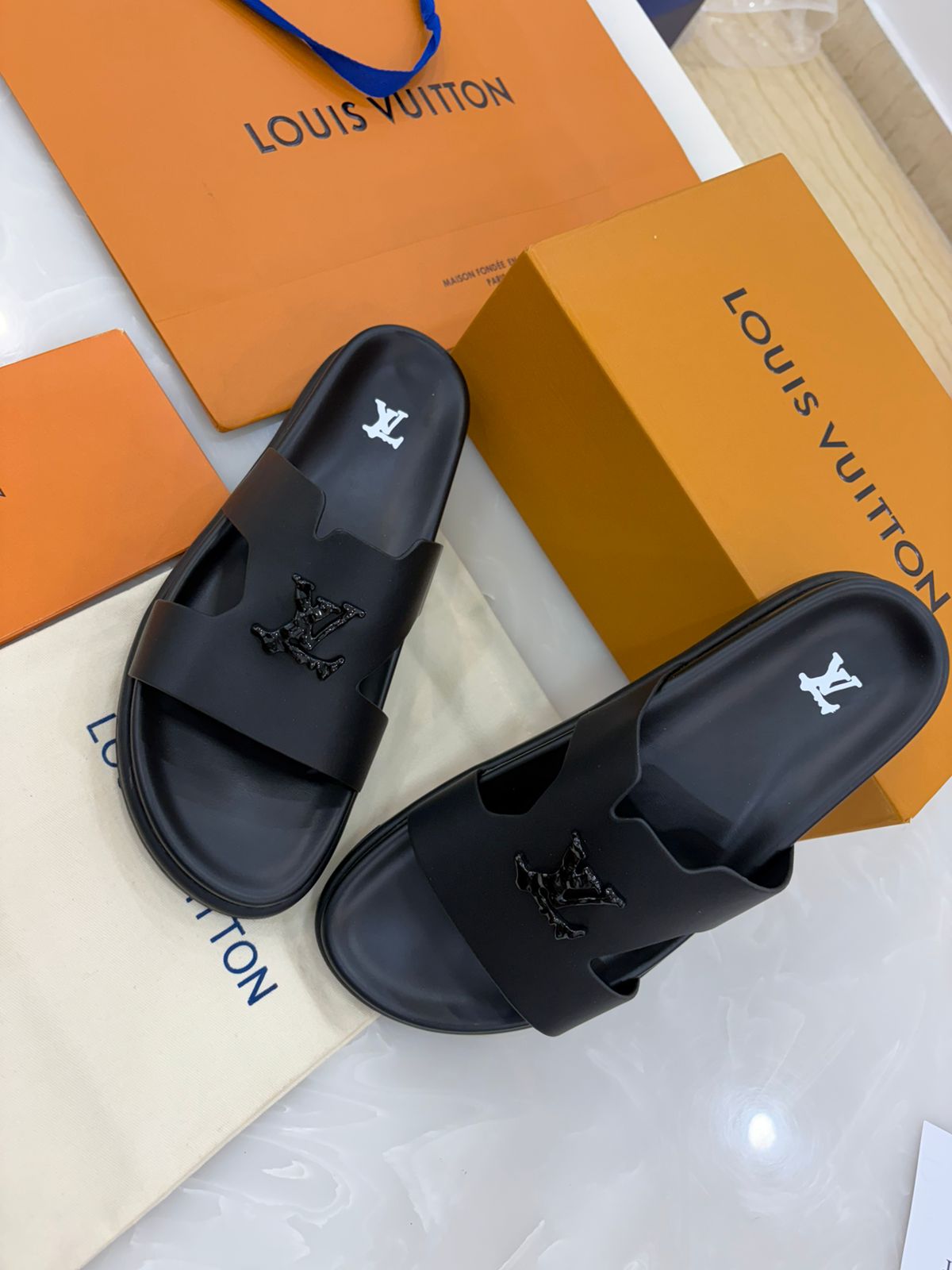 Black Louis Vuitton Oasis mules