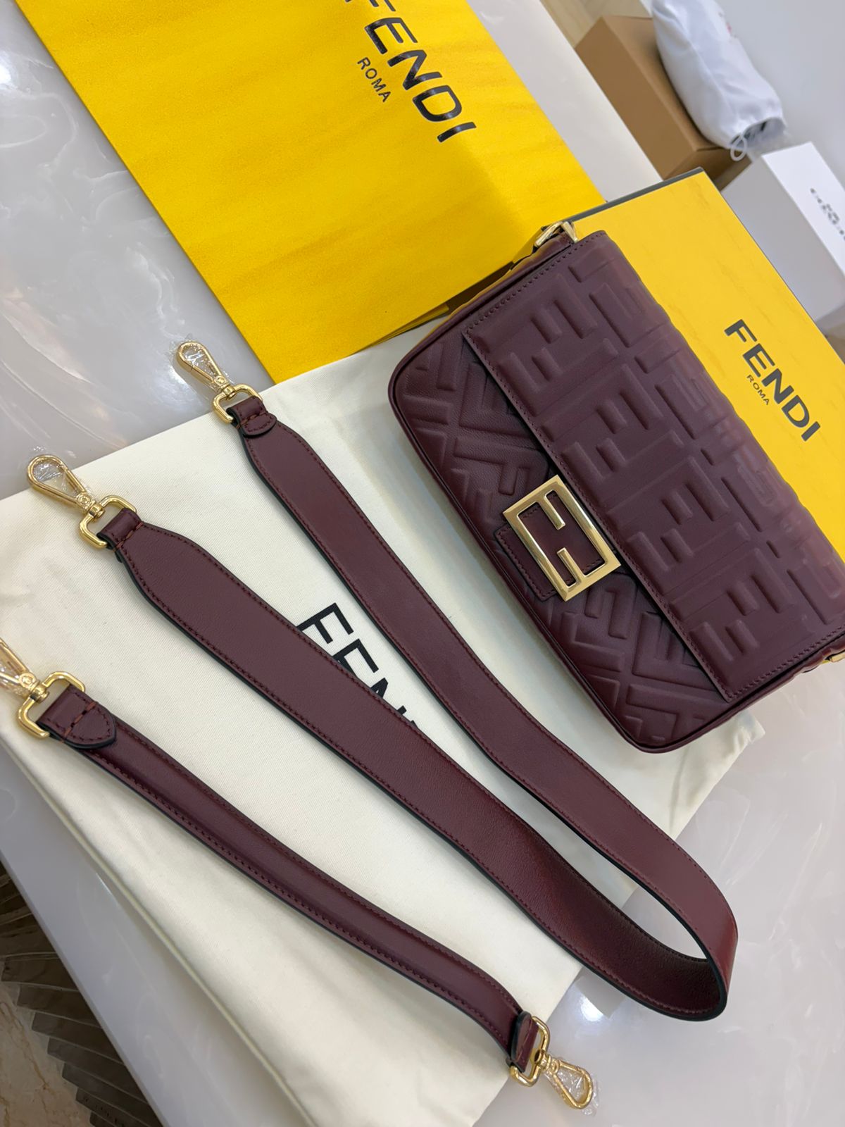 Fendi Baguette bag features embossed FF