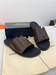 LV brown crocodile-embossed leather slides