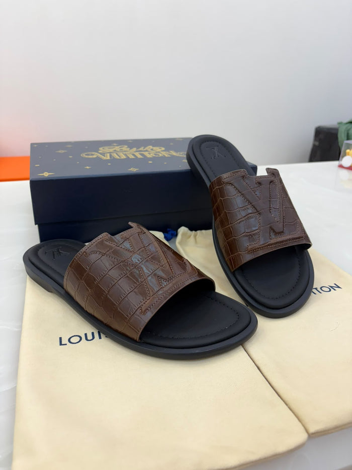 LV brown crocodile-embossed leather slides