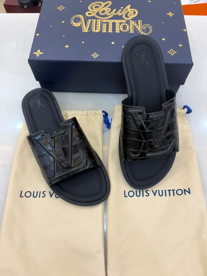 LV slide sandals featuring a crocodile-embossed