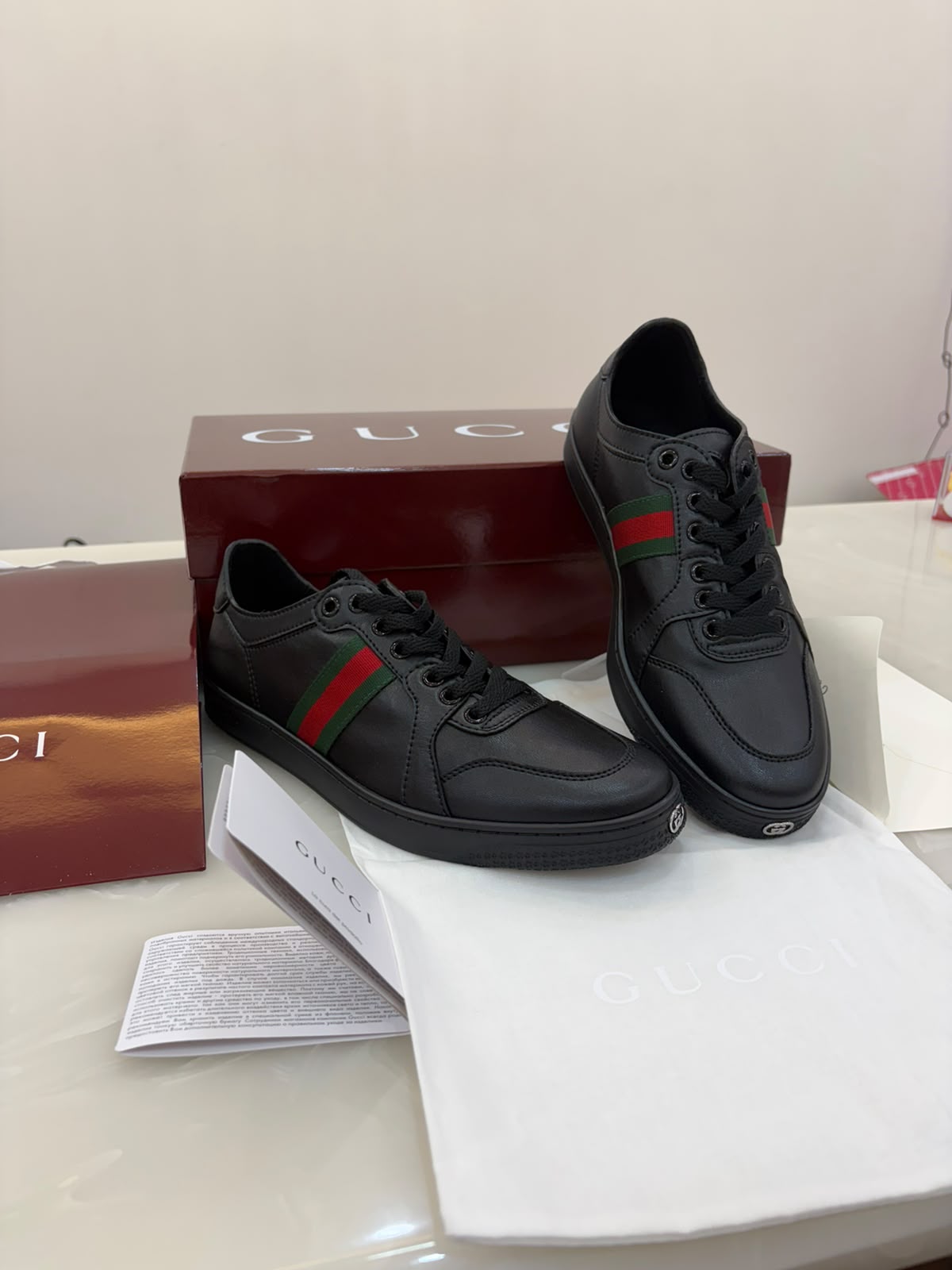 Gucci black leather low-top sneakers