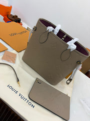 Louis Vuitton Neverfull MM in embossed beige Monogram
