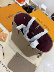 Louis Vuitton Neverfull MM in embossed beige Monogram