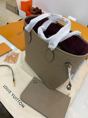 Louis Vuitton Neverfull MM in embossed beige Monogram