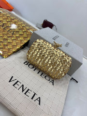 Bottega Veneta Knot Minaudière Clutch a stunning statement piece.