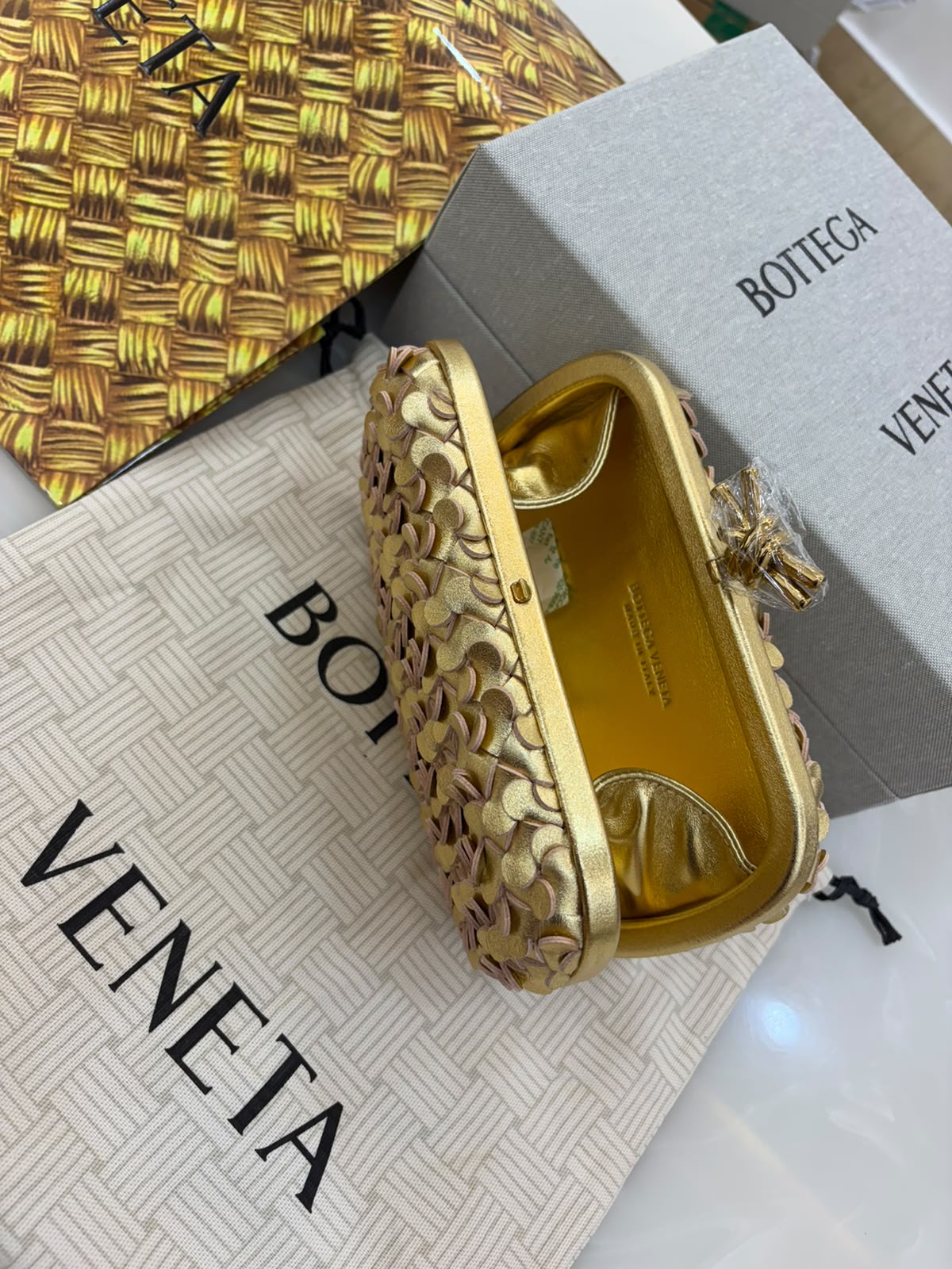 Bottega Veneta Knot Minaudière Clutch a stunning statement piece.