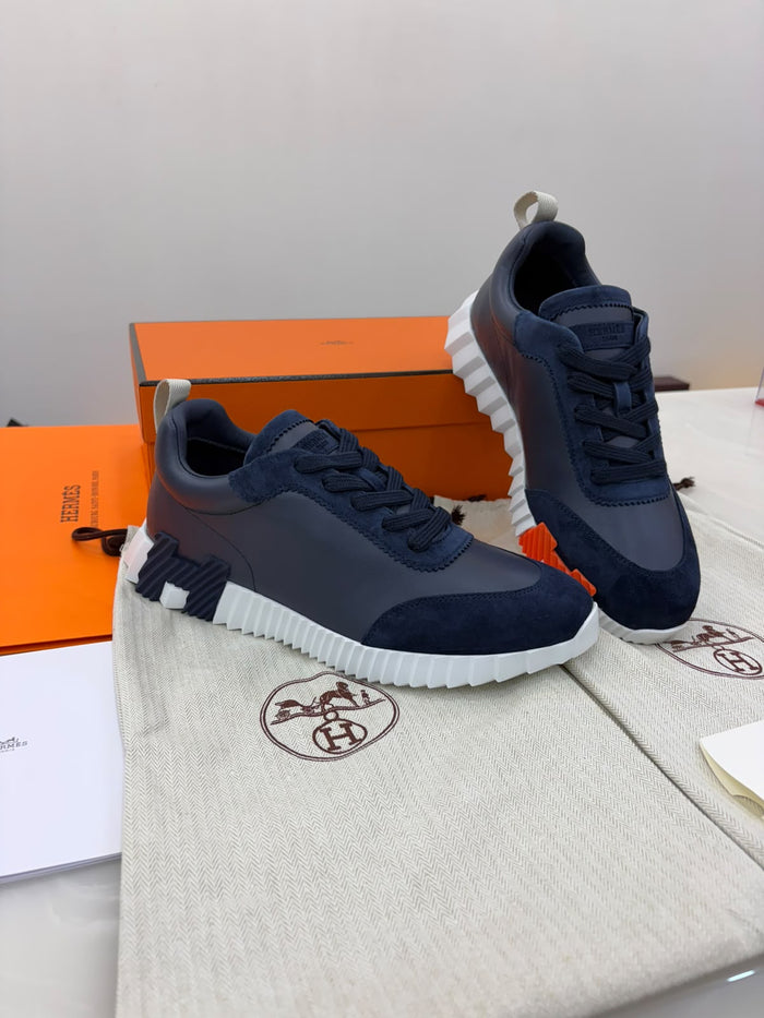 Hermès Bouncing Sneaker in navy calfskin and suede