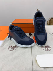 Hermès Bouncing Sneaker in navy calfskin and suede