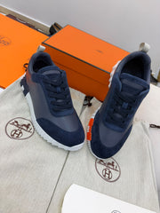 Hermès Bouncing Sneaker in navy calfskin and suede
