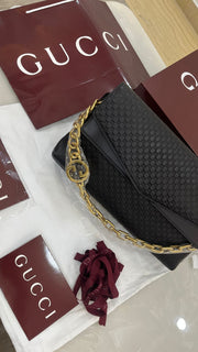 Gucci black embossed leather shoulder bag