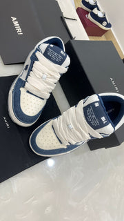 Amiri MA-1 sneakers in white and blue