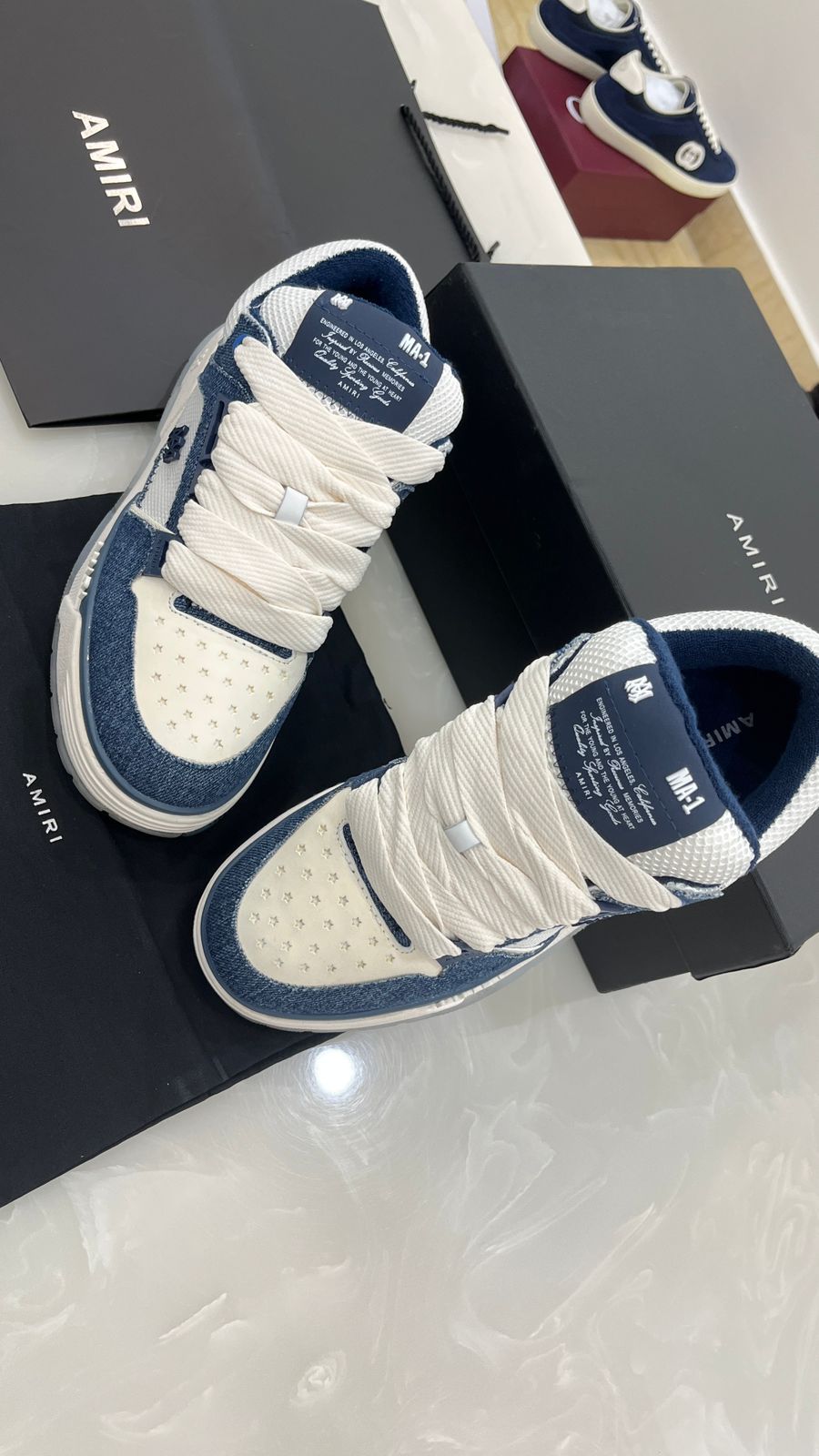 Amiri MA-1 sneakers in white and blue