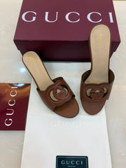 Gucci Interlocking G leather mules